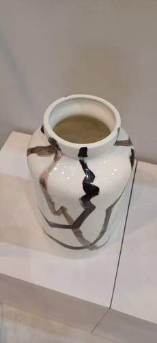 White ceramic vase dyed with Chinese black ink