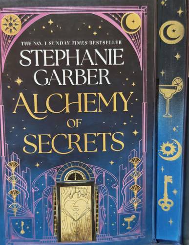 Alchemy of Secrets: The spellbinding new novel from the global No. 1 bestselling author of Caraval and Once Upon a Broken Heart Hardcover  Spray Edge 2025 by Stephanie Garber