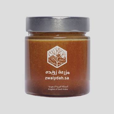 عسل بحبوب اللقاح والعكبر - السمر البري وزهور الربيع