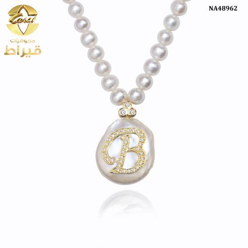 عقد لؤلؤ زراعي مع الماس و ذهب عيار 18