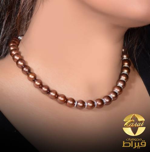 عقد لؤلؤ زراعي مع الماس و ذهب ابيض عيار 18