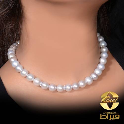 عقد لؤلؤ زراعي مع الماس و ذهب ابيض عيار 18