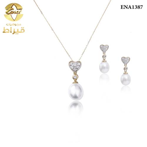 عقد و حلق الماس وذهب عيار 18