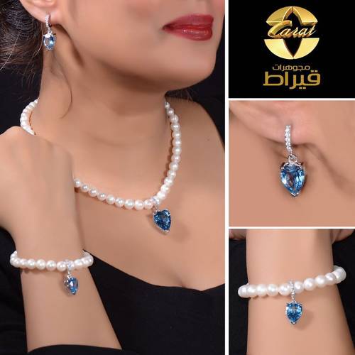 طقم  فضة مع  لؤلؤ و توباز صناعي 