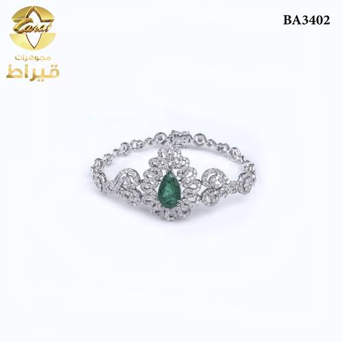  اسورة ذهب ابيض مع حجر زمرد و الماس عيار 18
