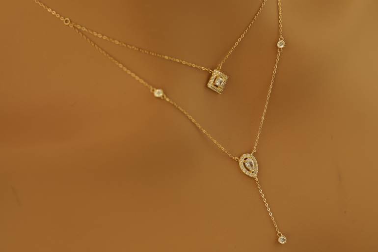 عقد دورين تصميم الماس عيار18 الوزن 2.32