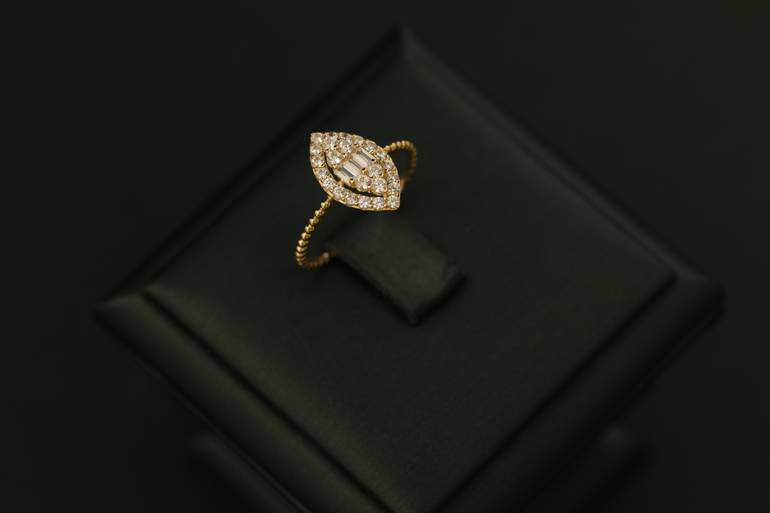خاتم تصميم الماس عيار18 الوزن ( 1.52 )