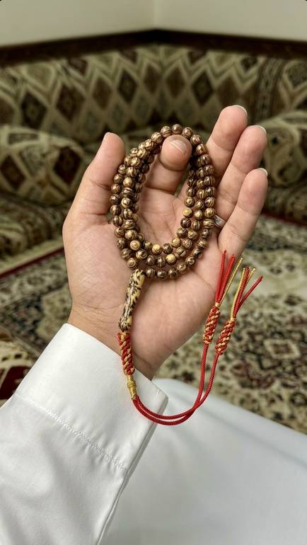 مسباح  بكلايت فاخر  عين النمر معرق مع كركوشة احمر واصفر تفصال – 99 حبة – حجم صغير
