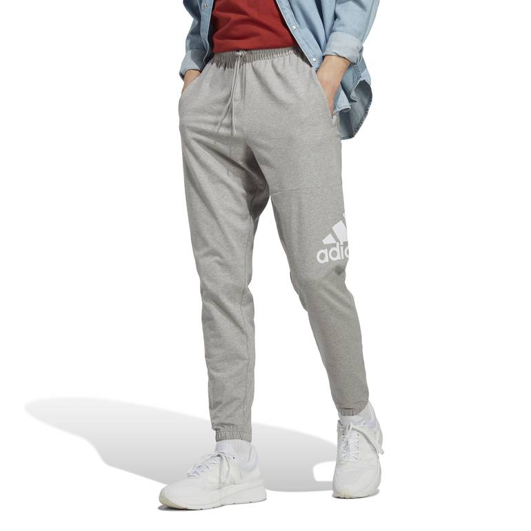 ESSENTIALS SINGLE JERSEY TAPERED BADGE OF SPORT PANTS - S