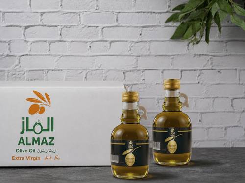 كرتون 15 زجاجة بمسكه 250مل زيت زيتون بكر فاخر