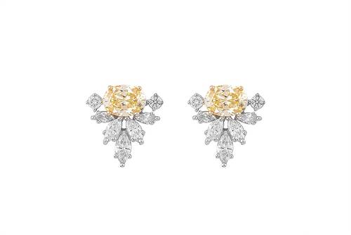 Diamond earring with yellow stone and 18k white gold