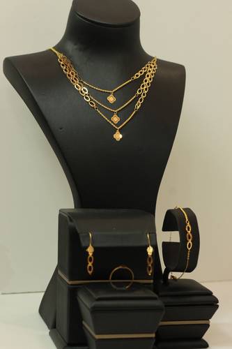 طقم ذهب عيار 21
