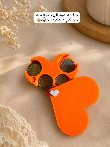 حافظة نقود معدنيه