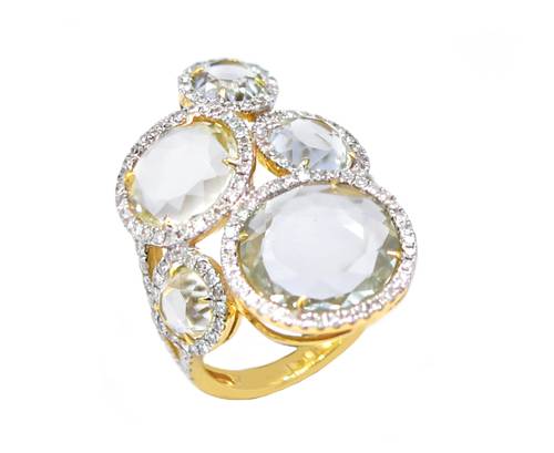 Diamond and natural stones ring