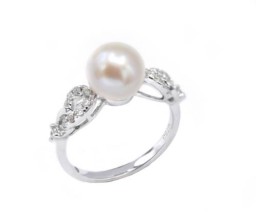 Cultured pearl and diamond ring