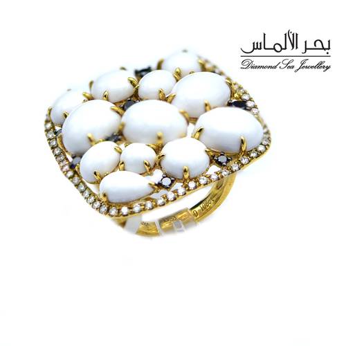 Diamond and natural stones ring