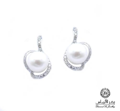 Cultured pearl and diamond earrings