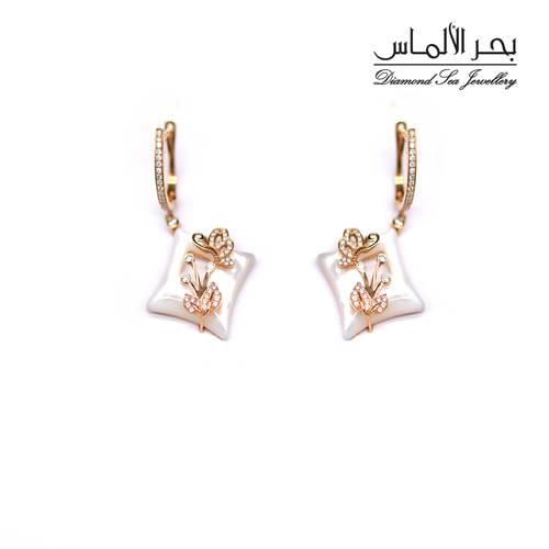 Diamond and shell earrings