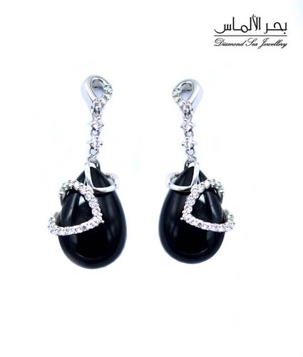 Diamond and onyx ring