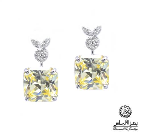 Natural diamond and yellow stone earring