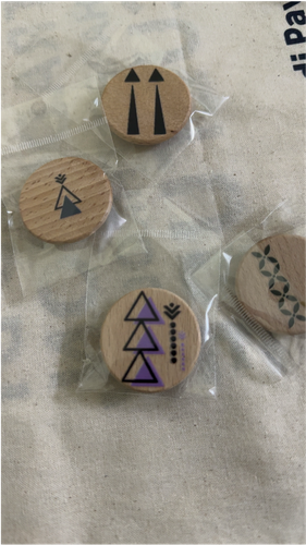 brooch with heritage motifs