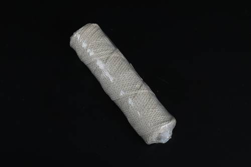 Spool of interwoven braided cotton thread 45