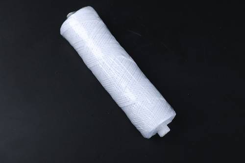 A spool of braided cotton thread . thickness 18