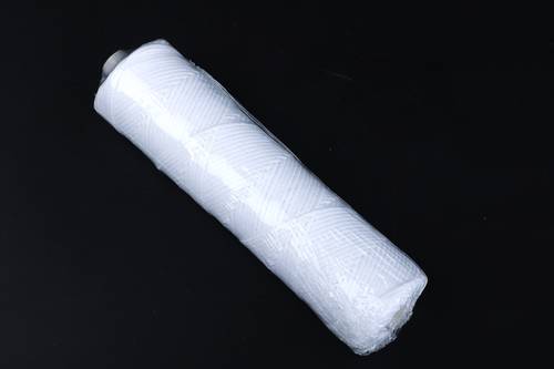 A spool of braided cotton thread . thickness 21
