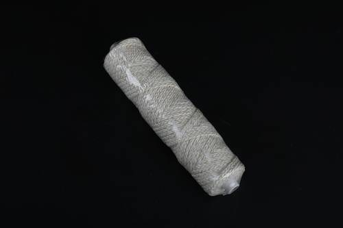 Spool of interwoven braided cotton thread 60