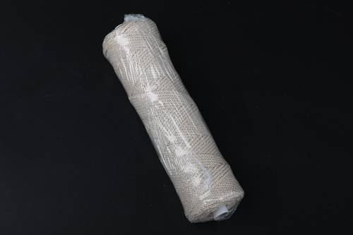 Spool of interwoven braided cotton thread 15