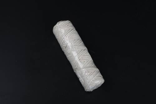 Spool of interwoven braided cotton thread 27