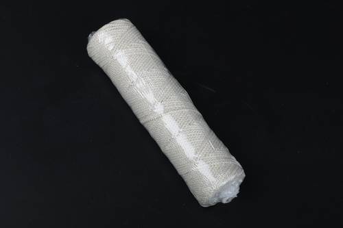 Spool of interwoven braided cotton thread 24
