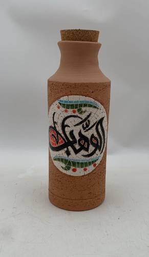 قارورة فسيفساء 600ملي  واكثر  (الوهاب)