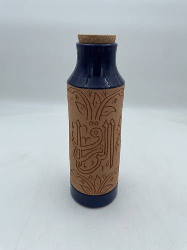 قارورة طراز مديني 600 ملي واكثر  (الرزاق) كحلي