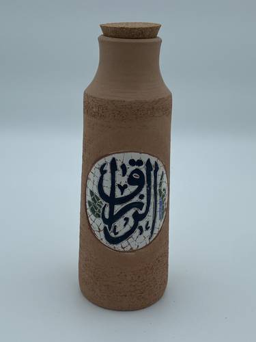 قارورة فسيفساء 600 ملي واكثر  (الرزاق)