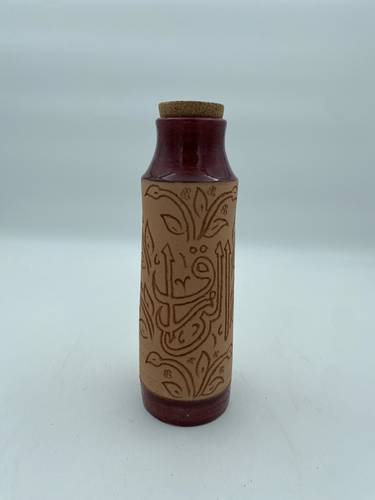 قارورة طراز مديني 600 ملي واكثر  (الرزاق) عودي