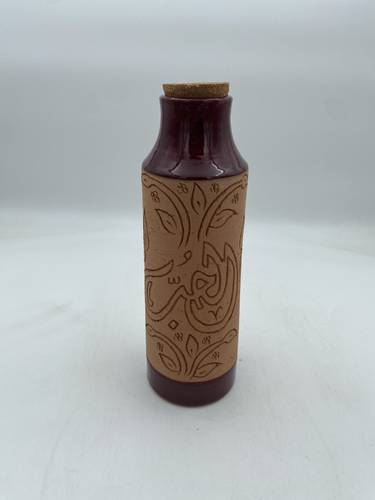 قارورة طراز مديني 600 ملي واكثر  (حب) عودي