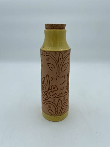 قارورة طراز مديني 600 ملي  واكثر  (السلام) اصفر