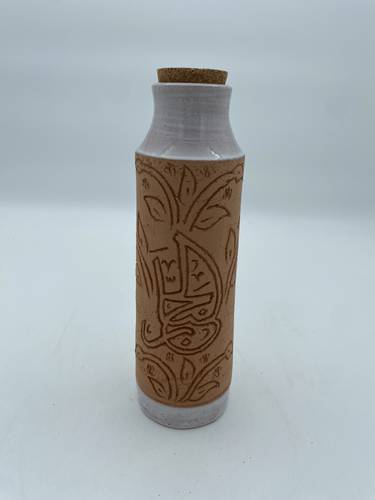 قارورة طراز مديني 600 ملي  واكثر  (الجبار) ابيض
