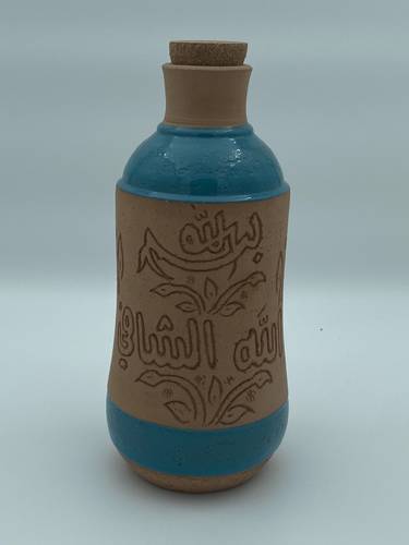 قارورة طراز مديني (بسم الله الشافي) تركواز لتر ونصف تقريبا