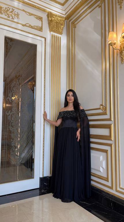 فستان سهرة أسود شيفون: أناقة ملكية بتطريزات فاخرة