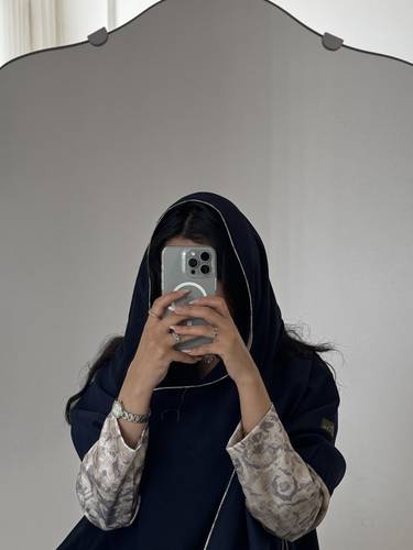 ‎015 عباية