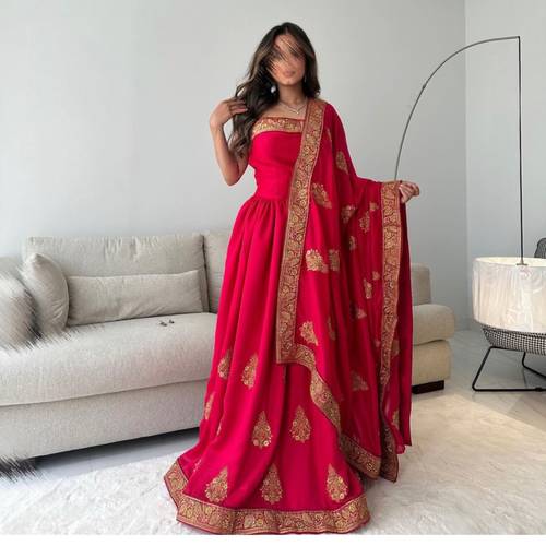 red and gold saree