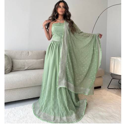 green and silver saree