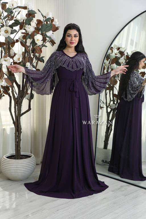 فستان سهرة ناعم بقصة أكمام مميزة 