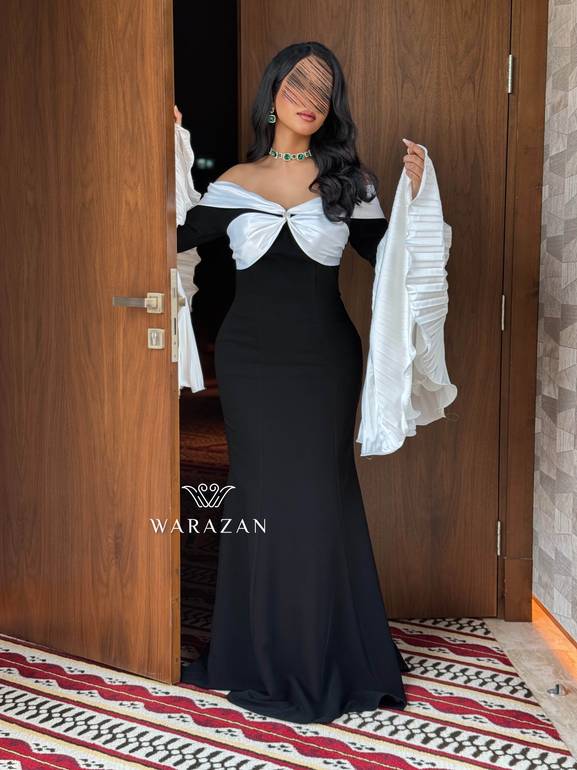 فستان سهرة راقي بأكمام بيليسيه واسعة 