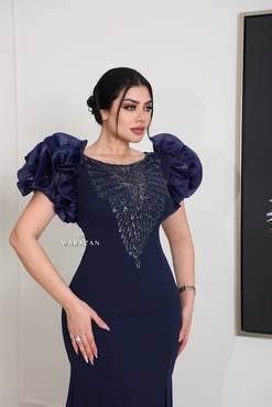 فستان سهرة ماسك بأكمام بف 