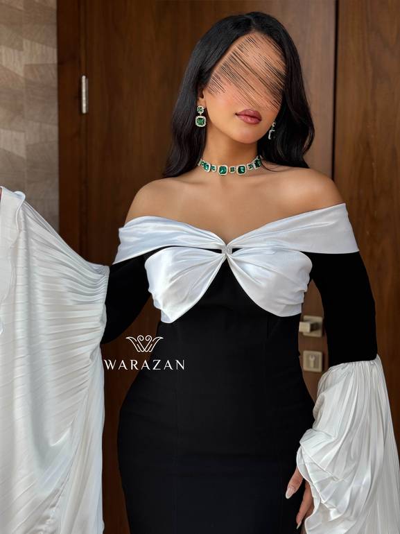 فستان سهرة راقي بأكمام بيليسيه واسعة 
