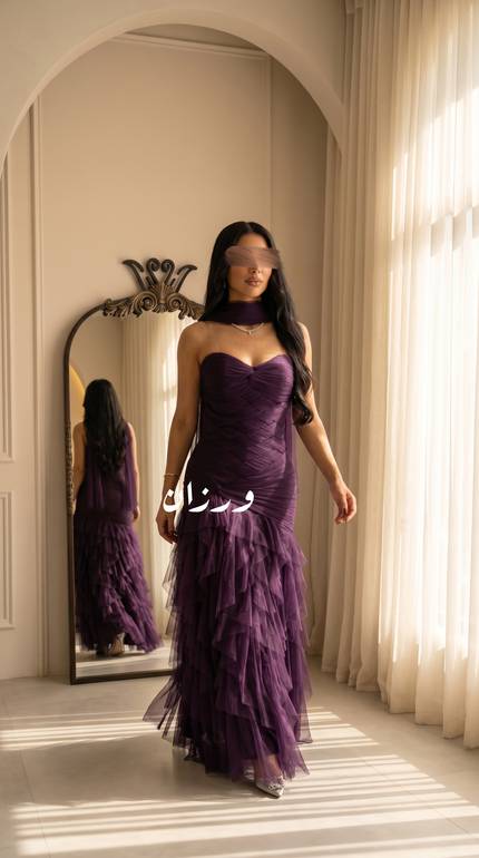 فستان سهرة بنفسجي داكن بتل انيق