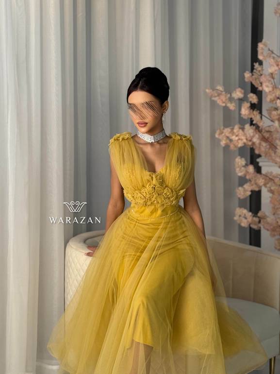 فستان سهرة بتدخيلة ورود من الخصر